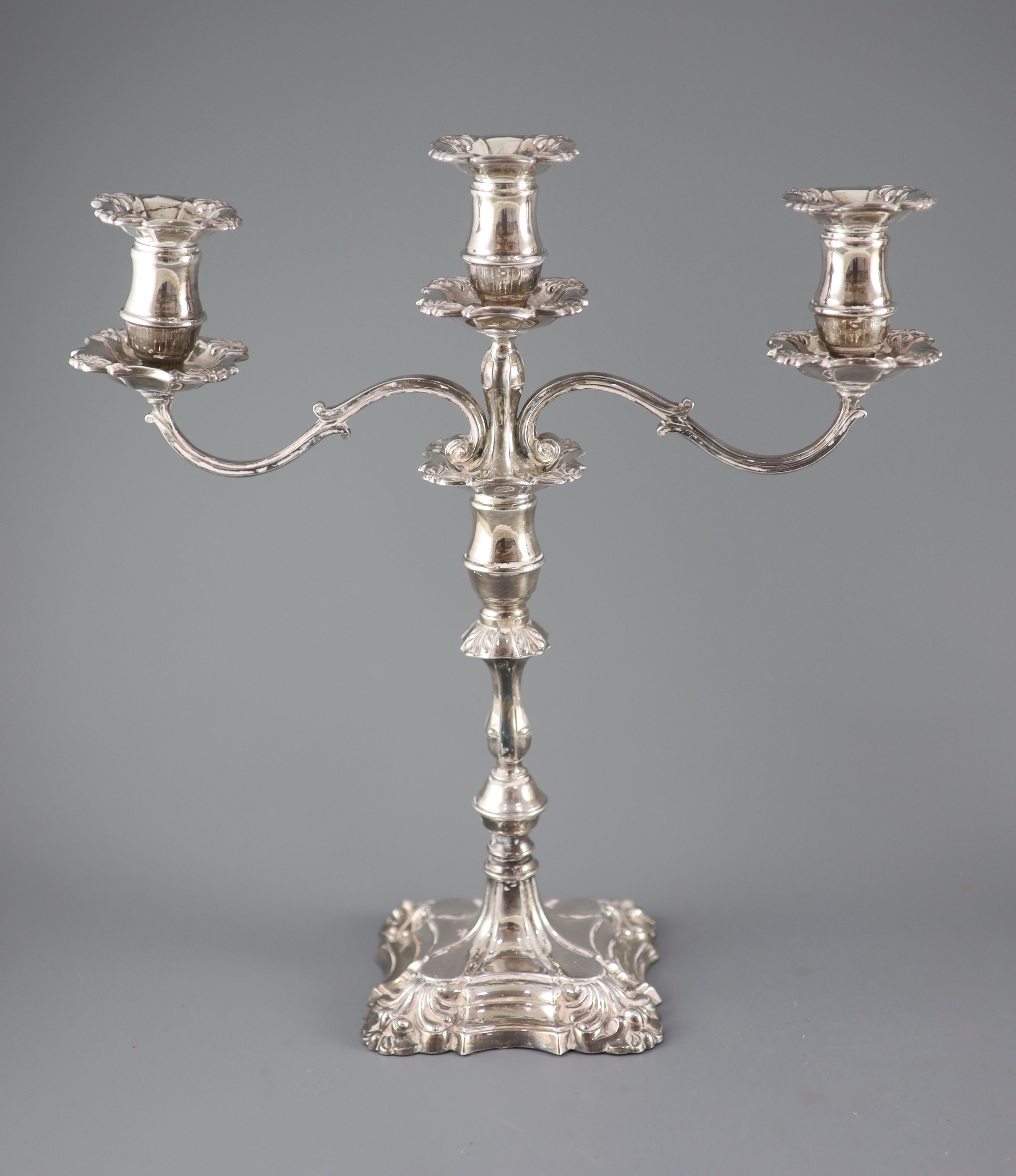 A modern pair of silver two branch, three light candelabra by Roberts & Belk